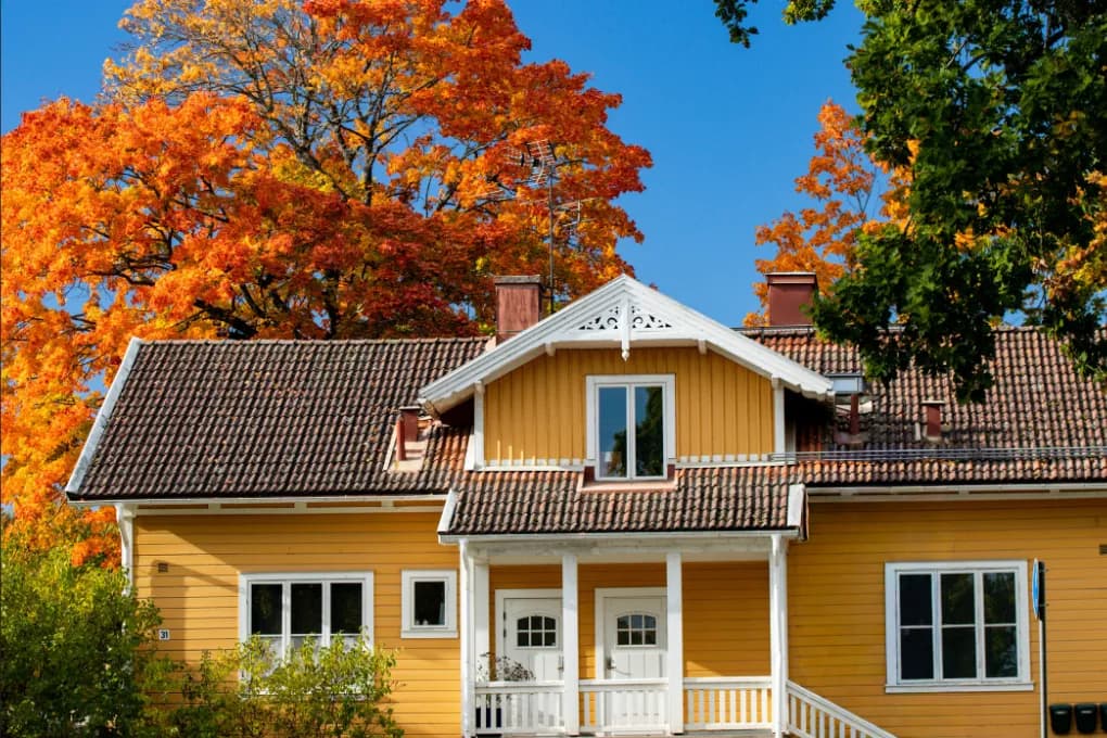 image of yellow house during fall