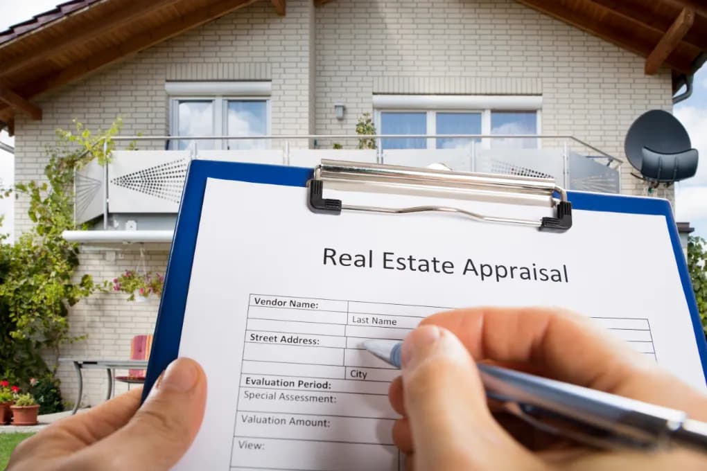 photo of a clip board with real estate appraisal document