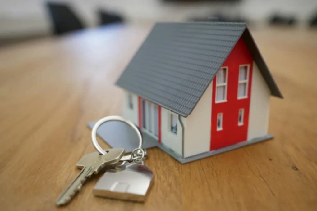 small toy house and key