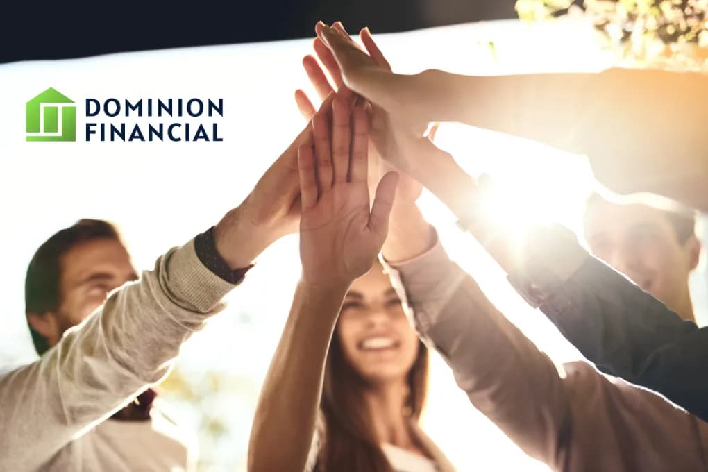 photo of business team members high fiving